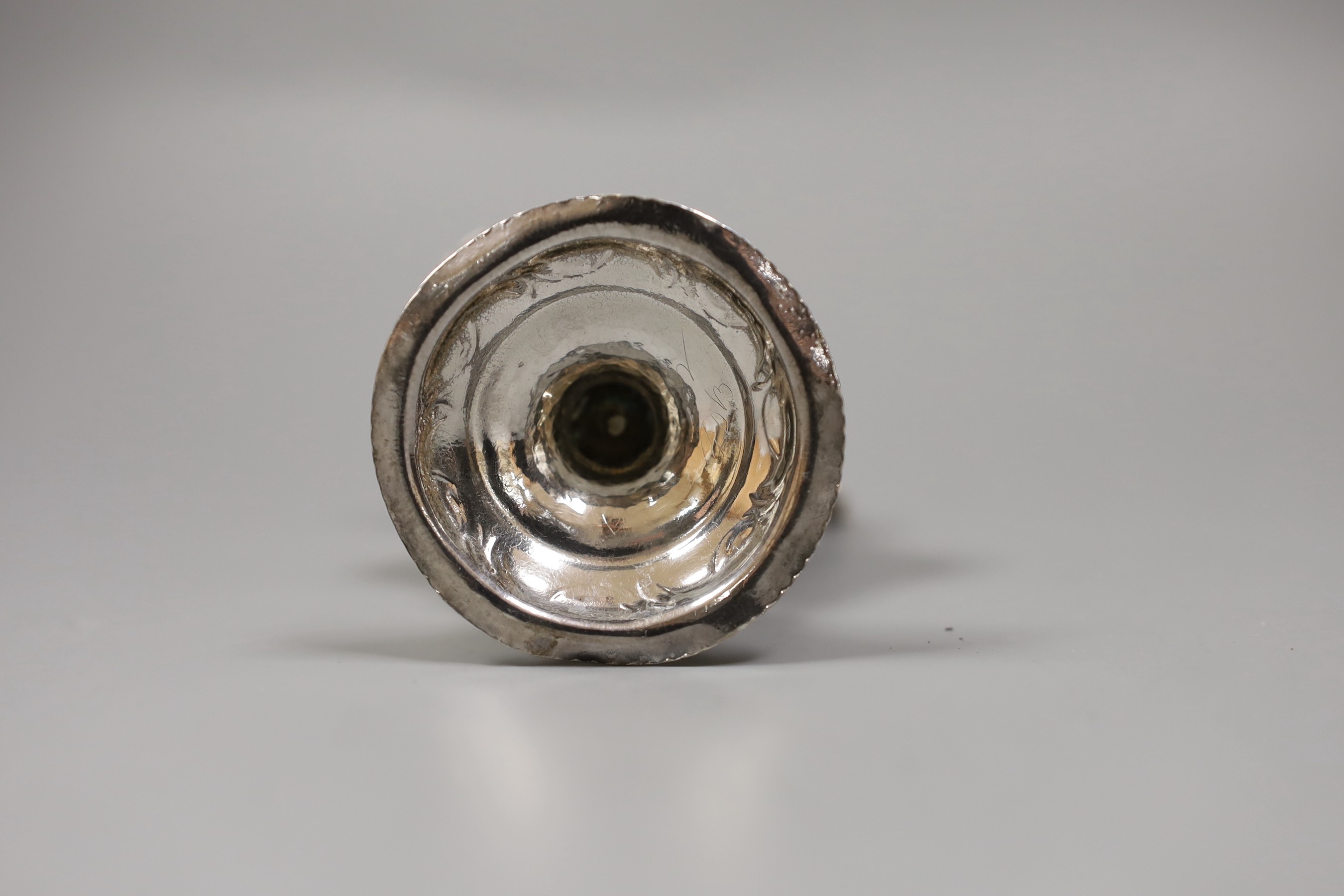 A George III silver inverted pear shaped cream jug, with later embossed decoration, Stephen Adams I, London, 1787, 12.3cm, 73 grams.
